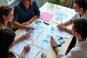 Team brainstorming mobile UI designs